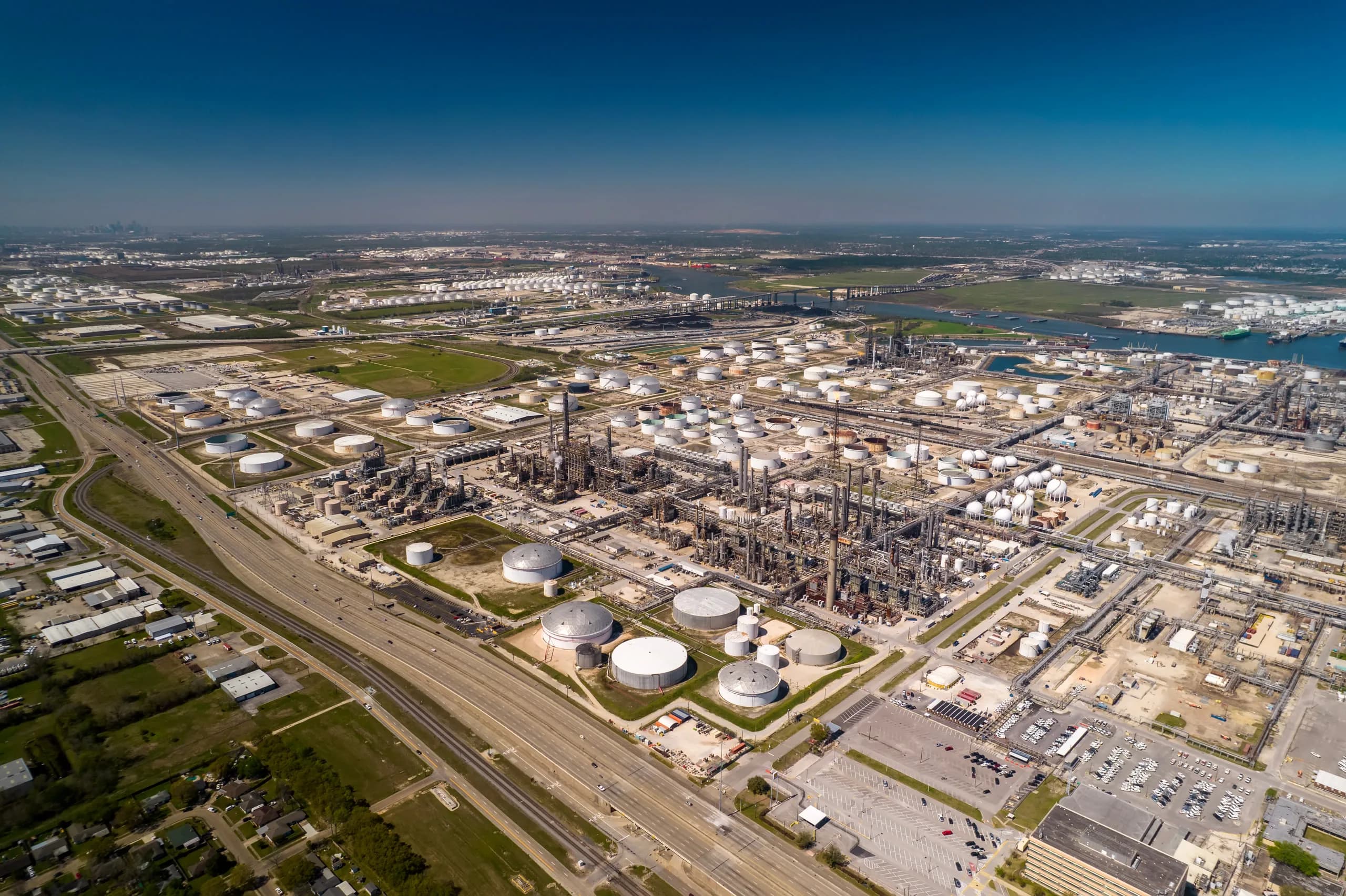 Industrial oil refinery representing commercial and industrial power infrastructure